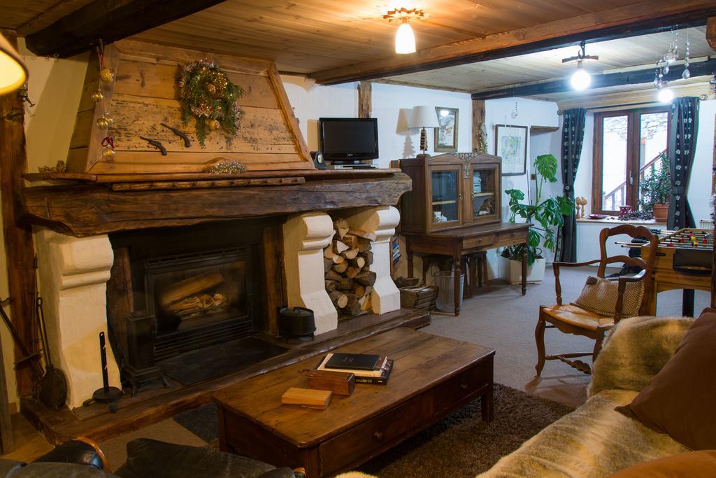 Bed and Breakfast Chalet Bois D'Antan Сент-Фуа-Тарентез Номер фото